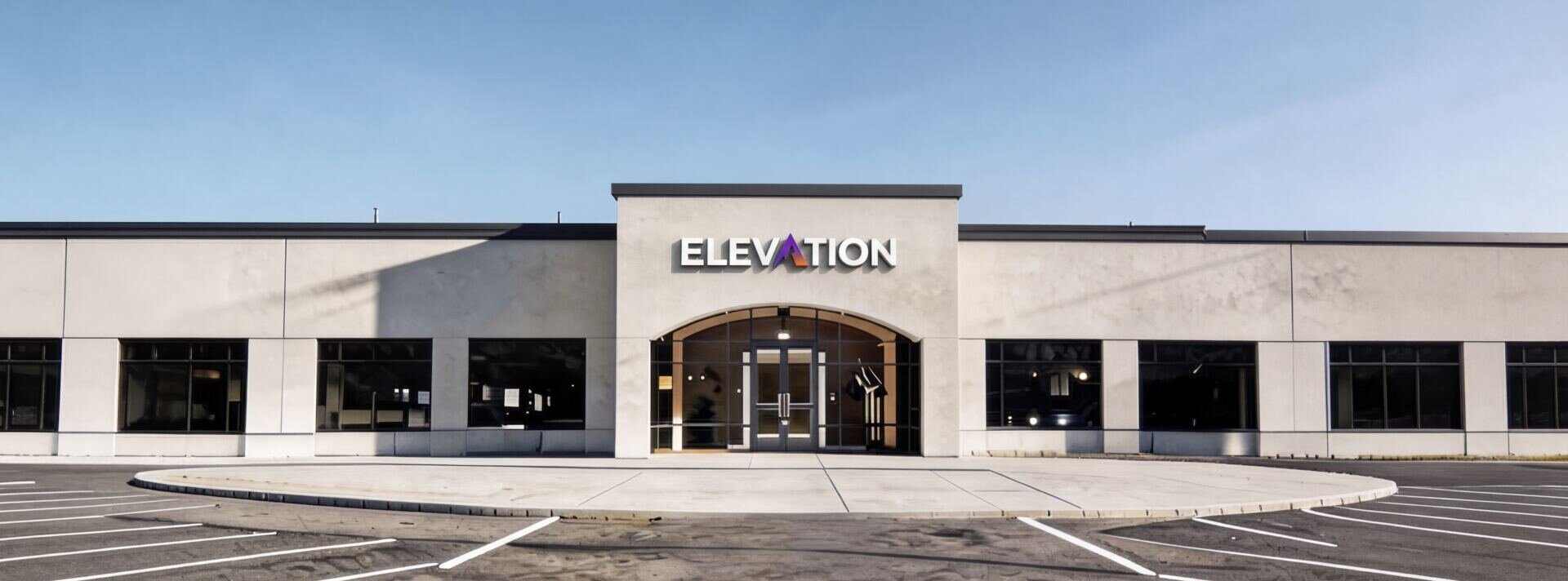 Elevation Energy certified installers mounting solar panels on a residential rooftop